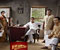 Abhishek Bachchan seating on chair in room